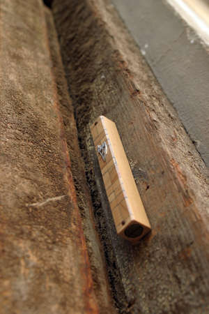 Mezuzah - Jewish symbol, on an old door.の写真素材
