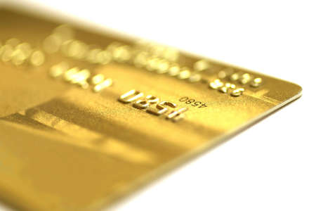 Golden credit card, macro, very shallow DOF.の写真素材