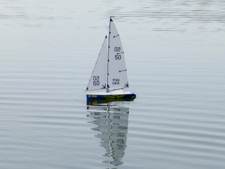 Children's toy sailboats on the water. Ship models. Close up