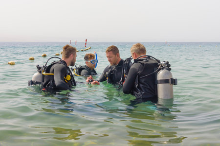 Eilat, Israel - May 2018: School of underwater diving. Divers group befor diving. A popular water sport and leisure activityのeditorial素材
