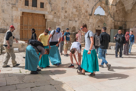 Jerusalem, Israel - 6 May 2018: Young men wear skirts to hide their legs. Travel photoのeditorial素材