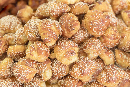 Freshly oriental buns with sesame. The regional traditional cuisine of Israel. Travel photo. Backgroundの写真素材