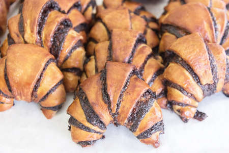 Oriental croissants with chocolate. Small, crispy, tasty croissants. Regional traditional cuisine of Israelの写真素材