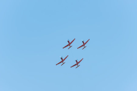 Four military airplanes in the blue sky over the sea in Tel Aviv. Independence Day in Israel, a national holiday. Israel Air Force paradeのeditorial素材