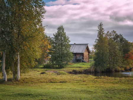 Kizhi, Russia - September 19, 2021: A wooden house on the island of Kizhi. Autumn village landscapeのeditorial素材
