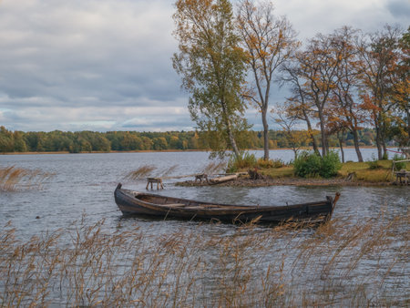 Kizhi, Russia - September 19, 2021: Lake Onega and boats by the Kizhi island. Autumn lake landscapeのeditorial素材