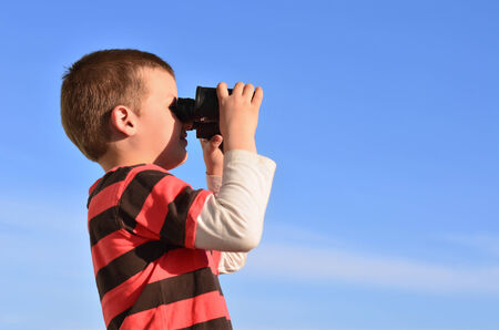 Little boy observing surroundings in middayの写真素材