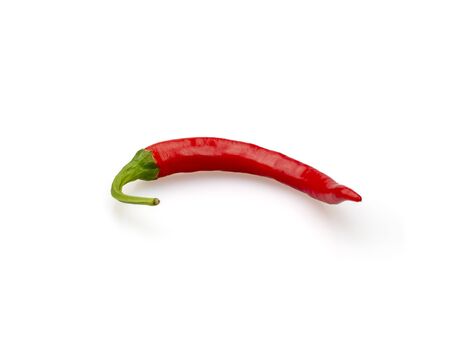 Red chili pepper close-up on a white background. Isolated.の写真素材