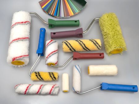 Rollers for paint and varnish. Color palette. Construction tool, painting. On a neutral background. Still life.の写真素材