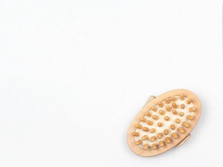 Massage brush, bathroom accessories. Subject on a white background.の写真素材