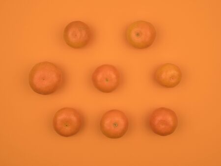 Ripe tangerine on an orange background. Citrus fruits. The view from the top.