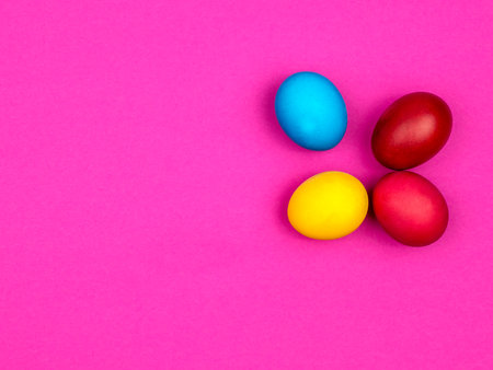 Bright painted eggs for Easter. Pink background.の写真素材