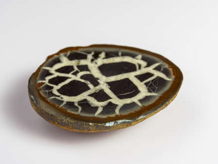Septaria on a white background. Turtle stone. Dragonstone.の写真素材