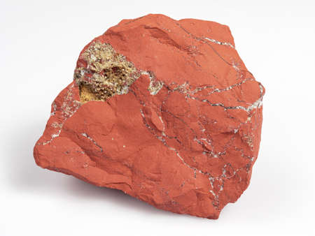 Jastic is red on a white background. Semi-precious ornamental stone.の写真素材