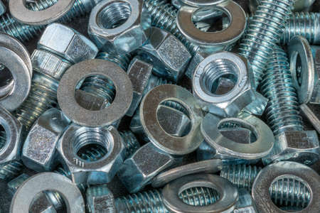 Bolts, washers and nuts close-up. Fasteners. Details for repair.の写真素材
