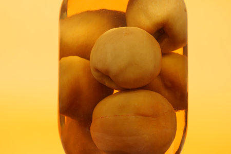 Master the art of canning peaches in syrup for longterm preservation and seasonal enjoymentの写真素材