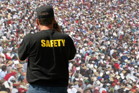 Security agent watching public eventのeditorial素材