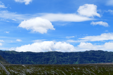 The delightful volcanic complex Bromo Tengger Semeru National Park against the background of fascinating views of nature, sky, craters and clouds.の写真素材