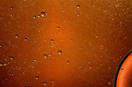 Oil in water, colored background, abstract pictureの写真素材