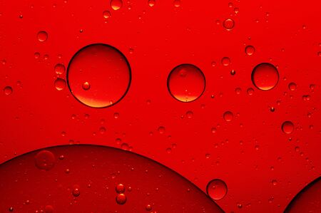 Oil in water, colored background, abstract pictureの写真素材