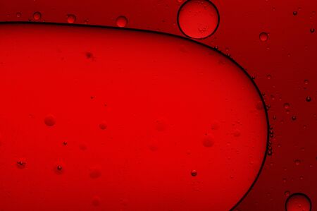 Oil in water, colored background, abstract pictureの写真素材
