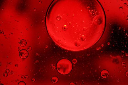 Oil in water, colored background, abstract pictureの写真素材