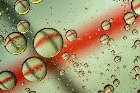 Oil in water, colored background, abstract pictureの写真素材