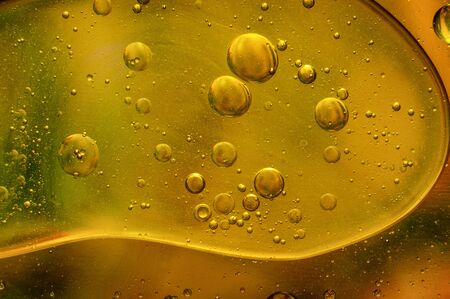 Oil in water, colored background, abstract pictureの写真素材