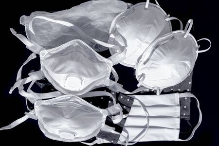 Masks and gloves for protection against viruses, allergies, epidemics and global pandemics. To fight against the coronavirus, COVID-19.の写真素材
