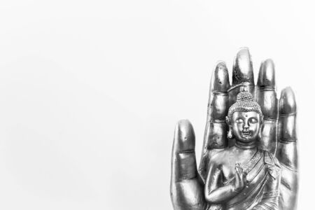 Buddha statue on white background.の写真素材