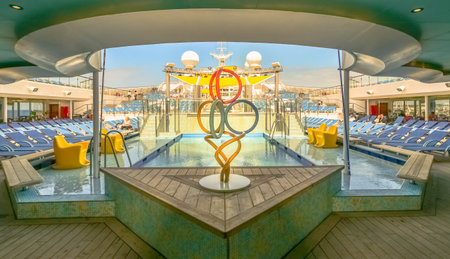 View of the swimming pool deck inside the Costa Fortuna cruise ship at the Civitavecchia port terminal, port of Rome, Italy, May 1, 2019.のeditorial素材