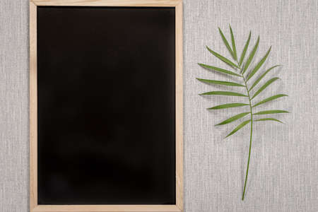 Slate blackboard template with empty space for logos, advertising lettering. Empty frame on a...