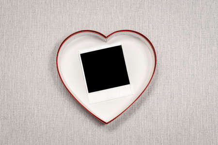 Heart template with empty space, advertising lettering, photography on a gray background with a photograph.の写真素材