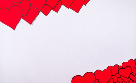 Valentine's day romantic composition, declaration of love, mother's day with space for text. Red hearts with empty space for a message. Vector icon.の写真素材