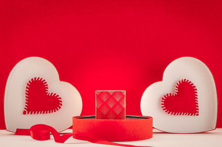 Wallpaper for Valentine's Day with red hearts and a gift package. Romantic composition for Valentine's Day, declaration of love, Mother's Day, birthday.の写真素材