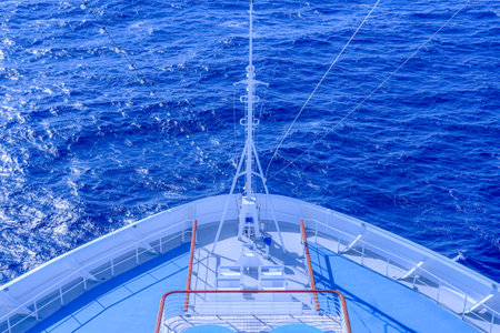View from the deck of a sailing ship in the open sea.
