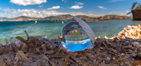 crystal ball on the beach of the island of Sardinia, Italyの写真素材
