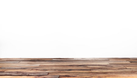 Wooden floor and white wall background with space for your text.の写真素材