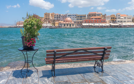 Bench on the promenade of the old town of Chania in Crete, Greeceの写真素材