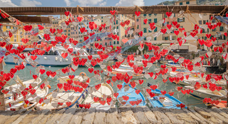 Valentine's day background with red hearts on the promenade in Camogli, Italyの写真素材