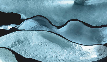 abstract background of blue ice in the cracks of the glacier.の写真素材