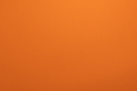 Orange abstract background with copy space for text or image. Top view.の写真素材