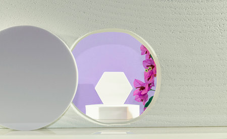 White round podium with purple flowers on white background. Mock up for product presentationの写真素材
