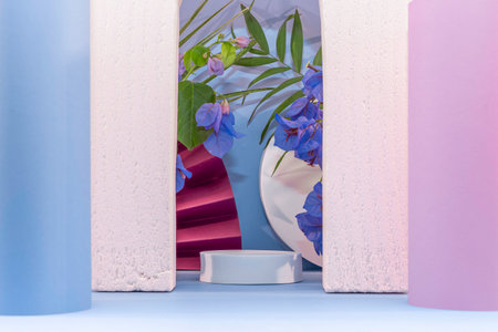 Podium, pedestal or platform for product presentation with blue flowers.の写真素材