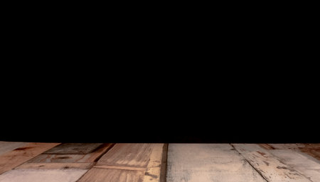 Wooden floor with black background, can be used as a backgroundの写真素材