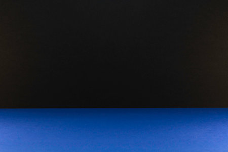 Blue table and black background for product display montage. Studio shot.の写真素材
