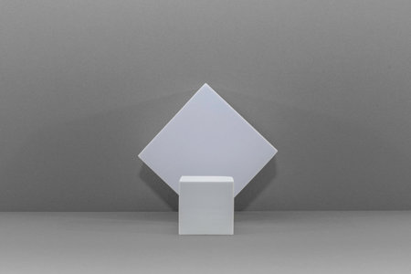 3d rendering of blank white podium on gray background. Mock upの写真素材