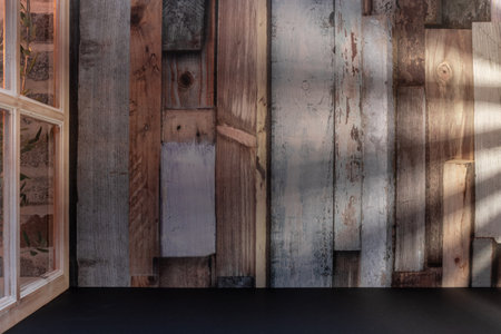 Empty black wooden table and old wooden wall background, for product display montageの写真素材