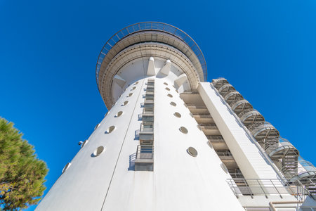 Lighthouse of the Mediterranean of the city of Palavas-les-Flots, in the south of France. Former water tower transformed into a panoramic restaurant.の写真素材