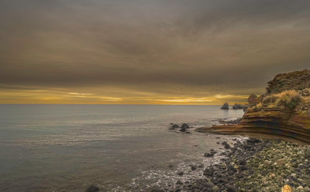 Sunset over the cliffs of Cap d'Agde, South of France.の写真素材